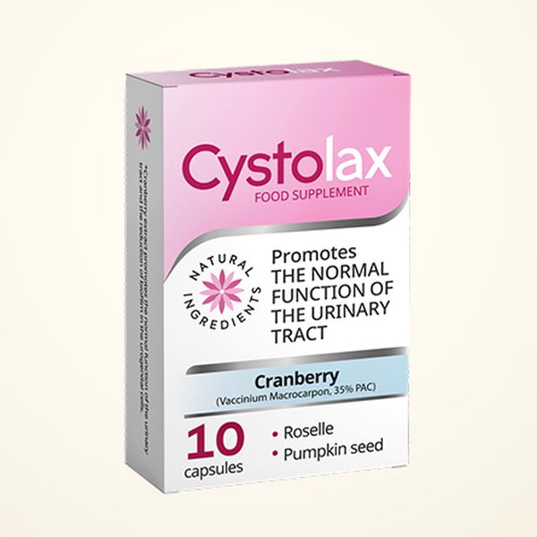 Vaaleanpunainen Cystolax-rasia, 10 kapselia, etiketissä karpalo 35 % PAC, roselle ja kurpitsansiemen
